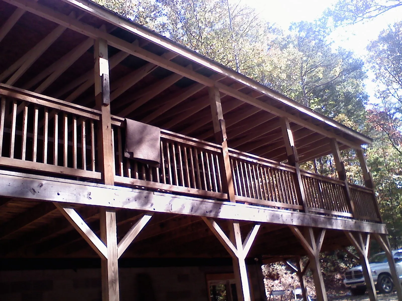 Timber framing under a new elevated porch and deck — Roof Leak Repair in Battleboro by Roofing Brothers